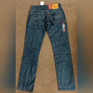 A pair of Levi's 511 men's jeans — size 31x32. Brand new with tags. Never worn.